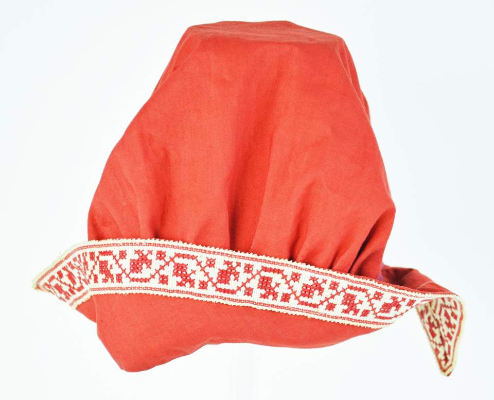 rote Bademütze mit Bordüre rot-weiss, um 1900