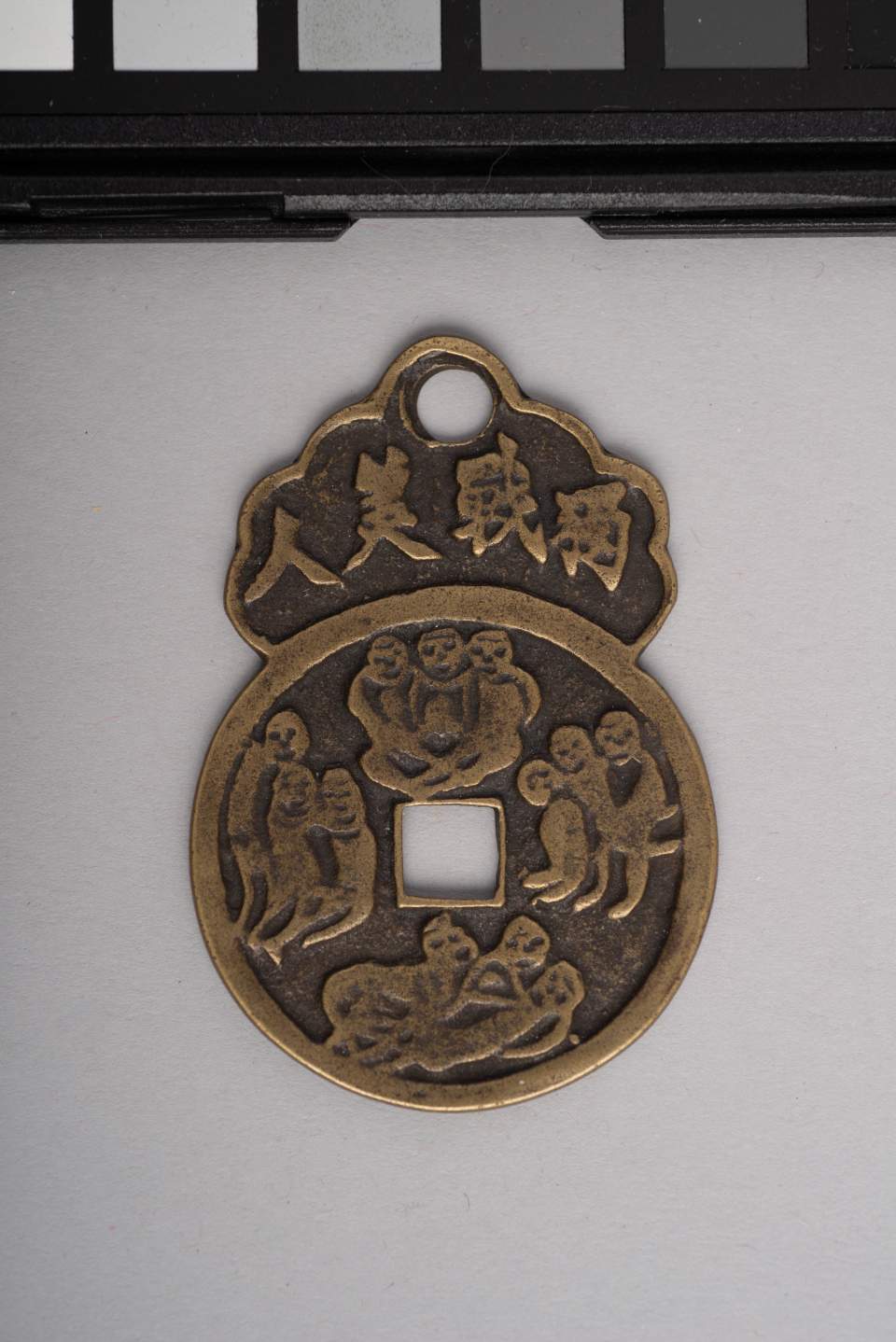 Amulett mit erotischen Darstellungen als Abwehrzauber